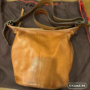 Coach 11422 Tattersall Leather Bleeker Bucket
Convertible Bag great condition